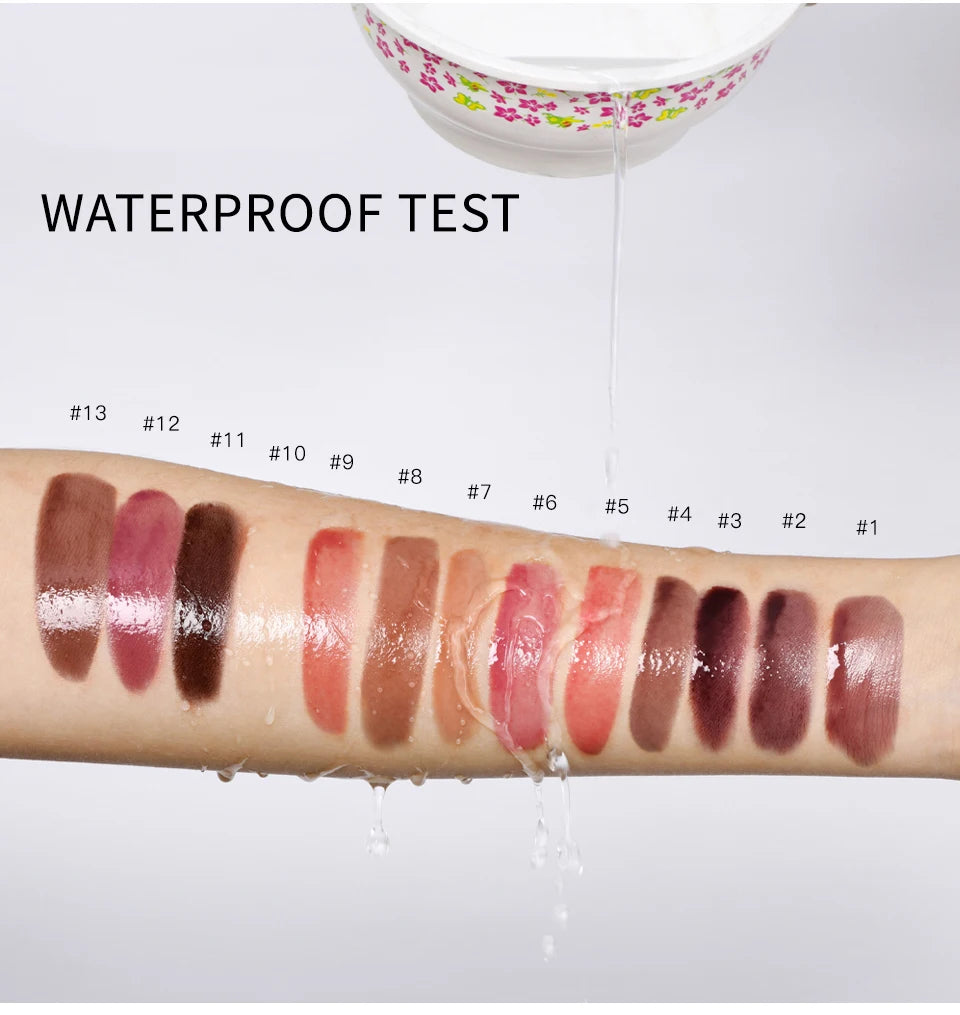 Waterproof test of mirror lip glaze swatches: glossy, moisturizing, butter-texture shades ranging from nudes to darks.