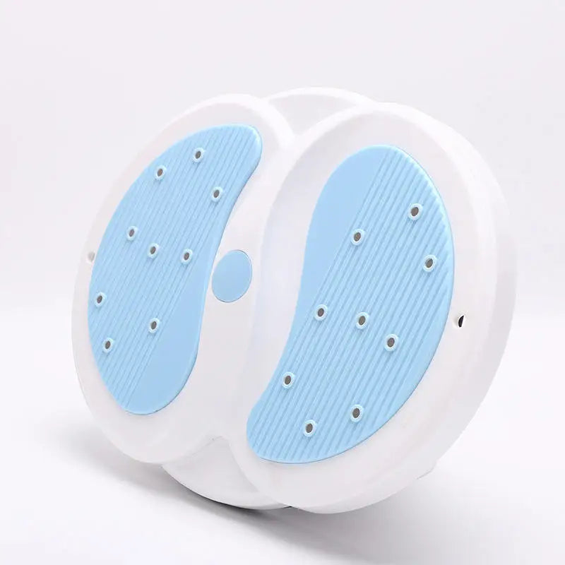 Round plastic waist twisting disc with white frame, light blue textured footpads, and small massage magnets.