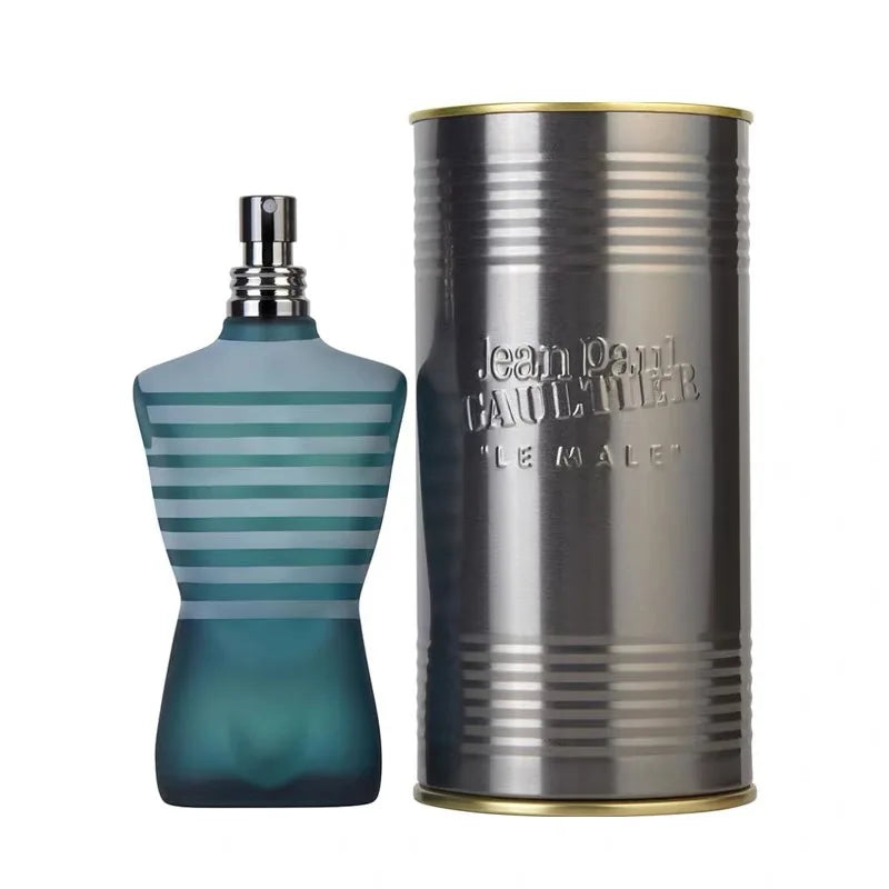 Jean Paul Gaultier Le Male men’s EDT, iconic striped torso bottle, blue glass, and metal canister display packaging.