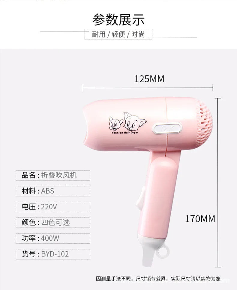 Pink foldable mini hair dryer with cartoon design, 400W portable, lightweight travel hair care tool.