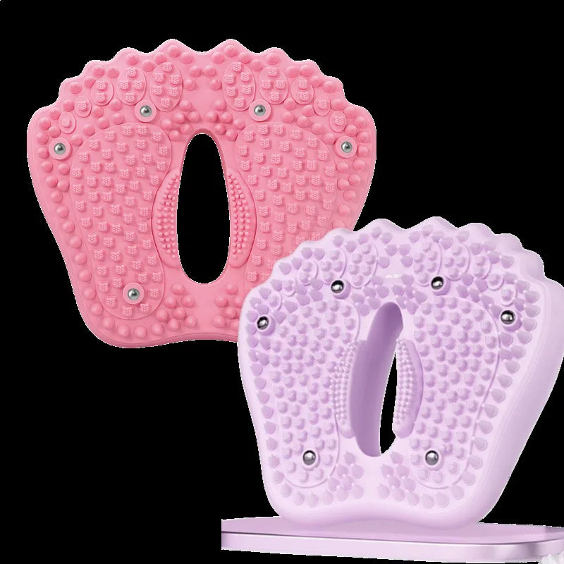Pink and lavender silicone foot massagers with textured nodules and metal roller balls for sole stimulation.