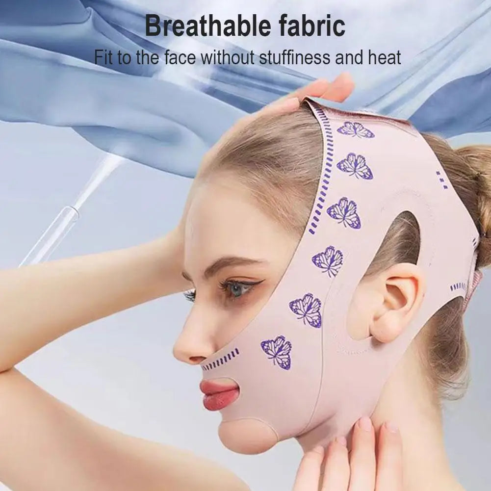 A light pink face-lifting bandage with purple butterfly patterns worn by a person, showing a contoured, breathable fit.