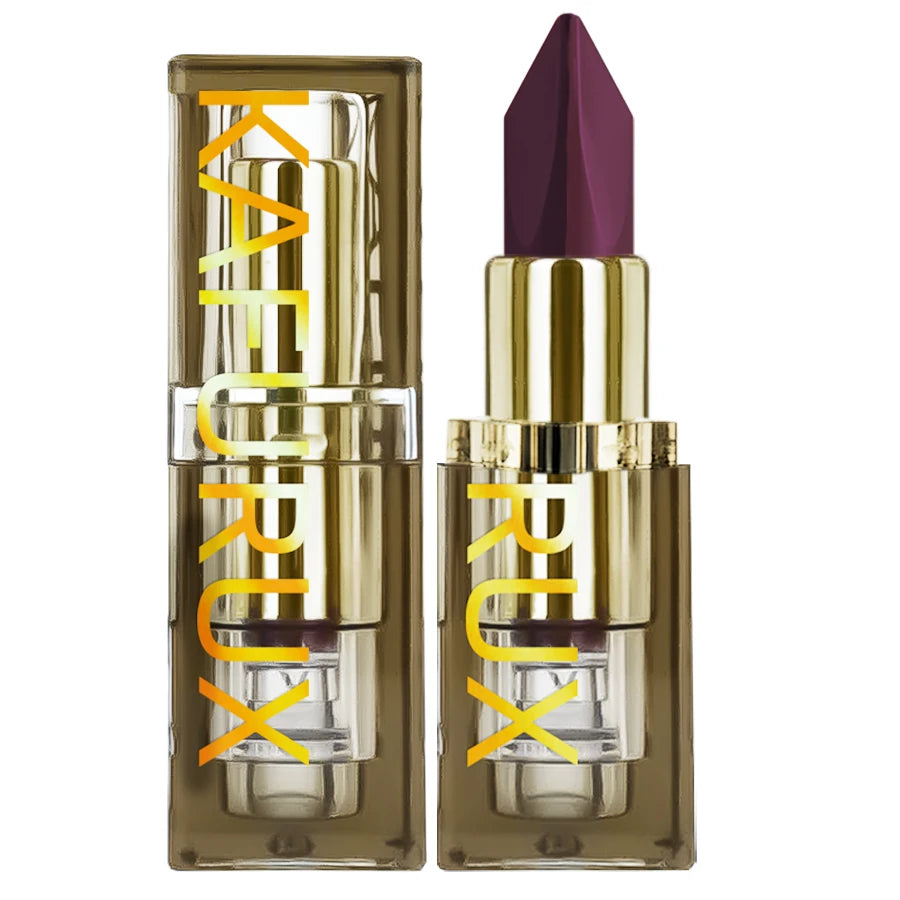 Dark purple matte lipstick in a luxury gold and clear square tube by KAFEURUX. Elegant moisturizing lip makeup.