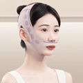 A person wearing a beige, breathable V-line face sculpting strap with purple heart patterns and ear cutouts.