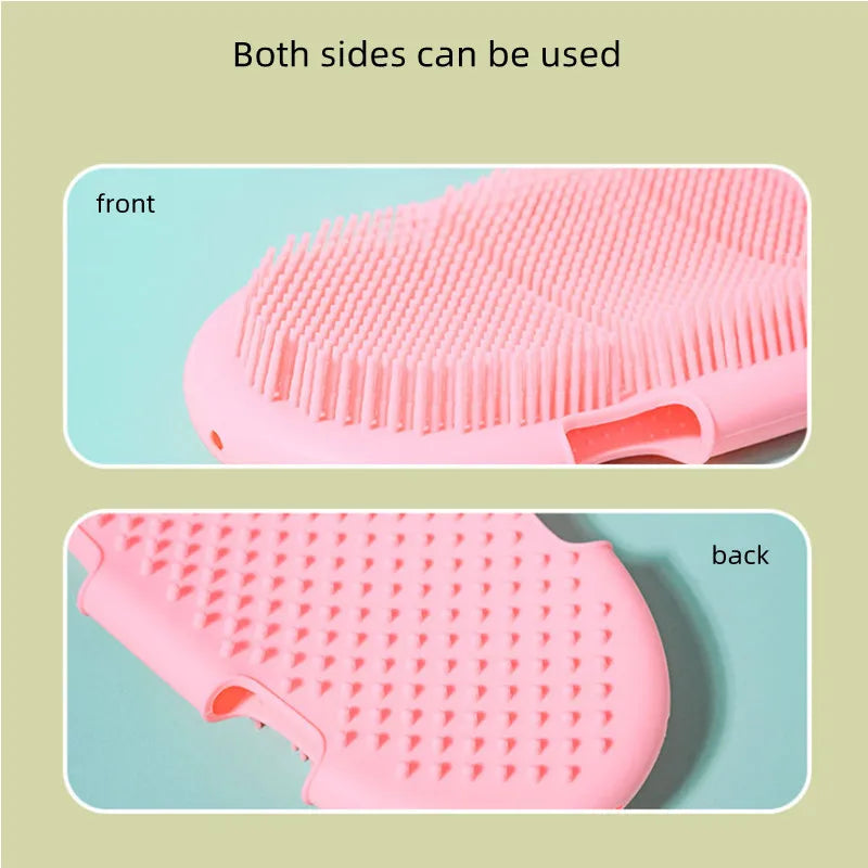 Pink silicone pet bath brush and massage glove for gentle grooming, deep cleaning, and exfoliation. Double-sided tool.