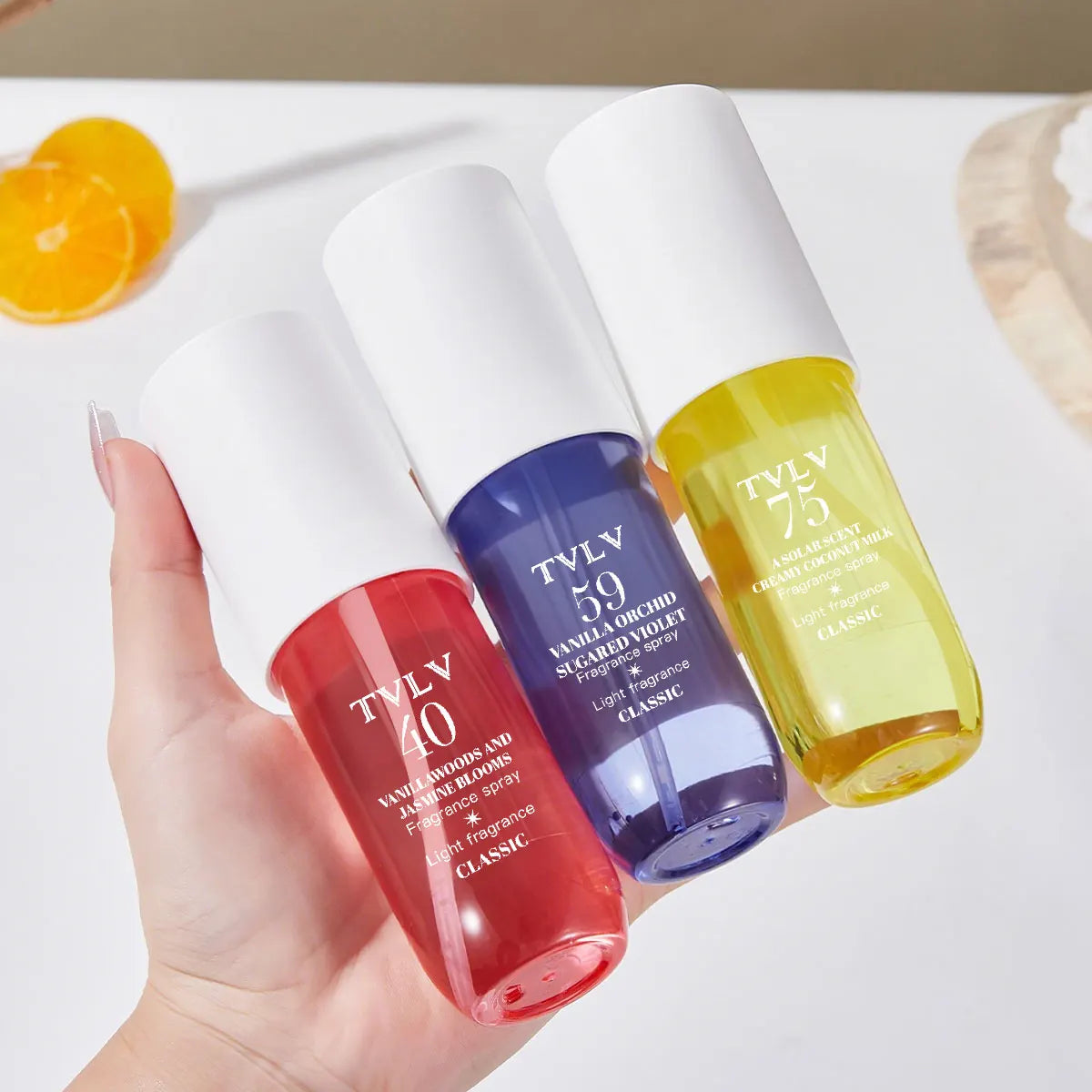 TVLV alcohol-free Brazilian perfume set: Vanilla, Jasmine, Coconut aromatherapy fragrance spray in sleek travel bottles.