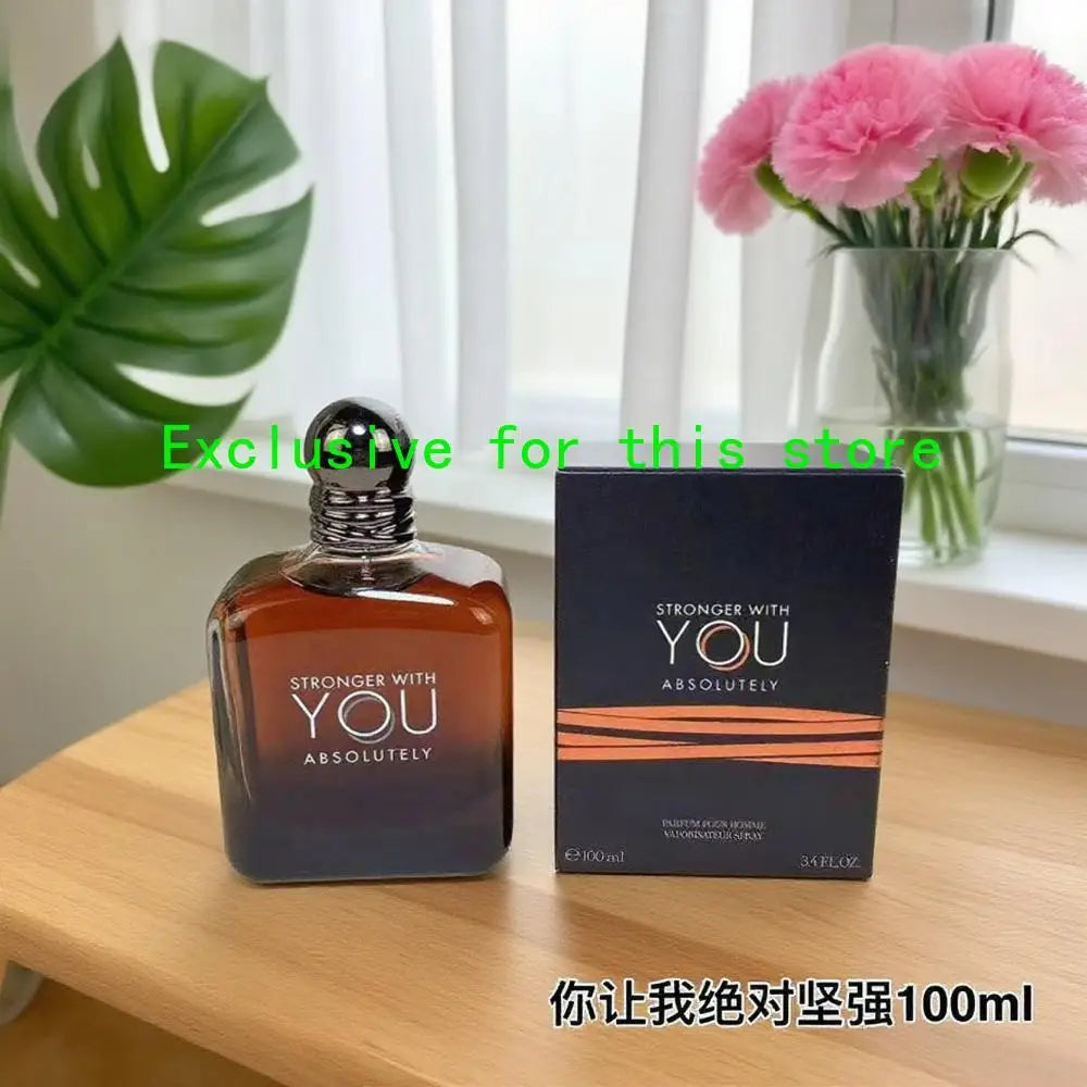 Stronger With You Absolutely 100ml perfume for men. Amber glass bottle with box. Long-lasting woody oud fragrance.