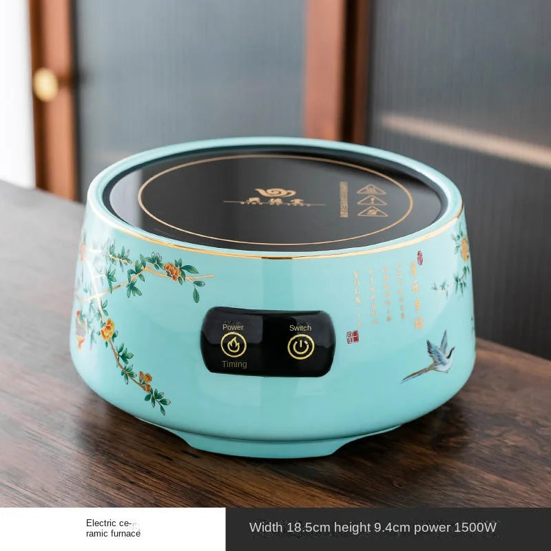1500W electric ceramic tea stove, light blue floral ceramic body, 18.5cm round base with digital power and timer.
