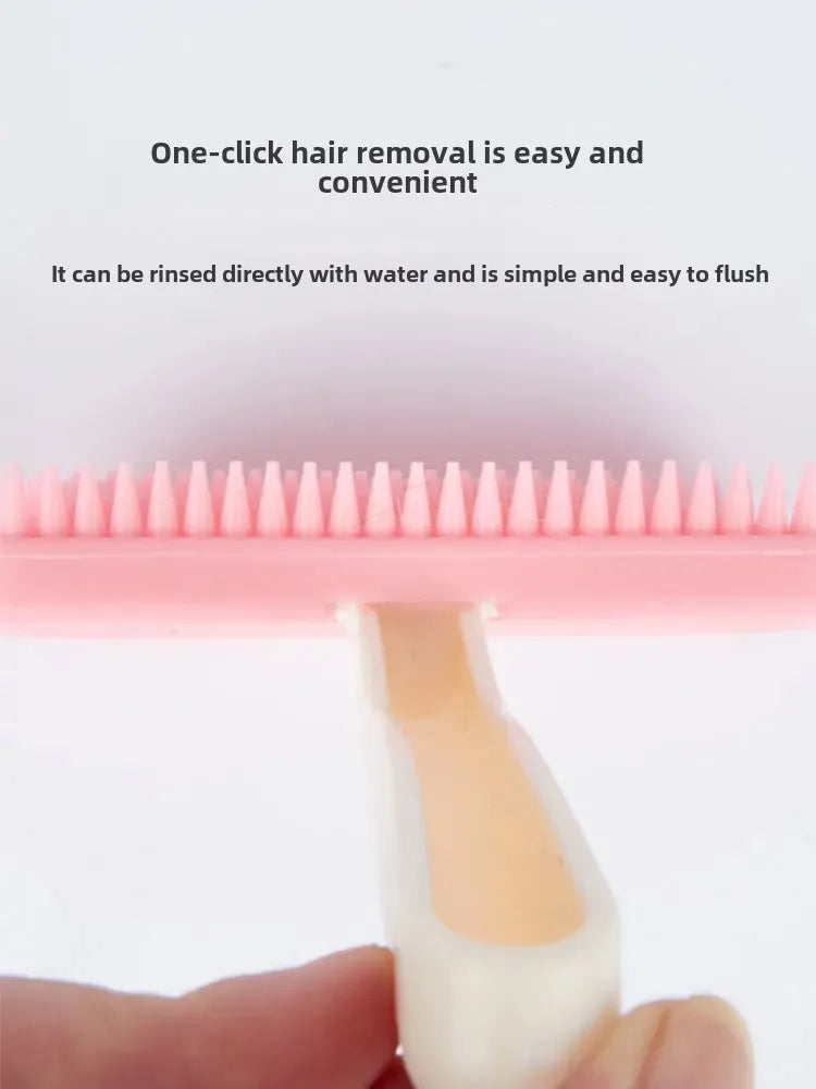 Pink silicone grooming comb for small pets like rabbits and cats, featuring one-click hair removal and easy rinsing.