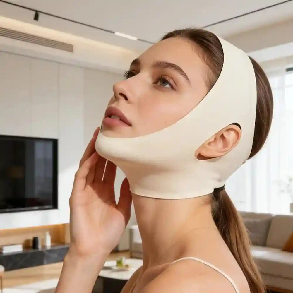 Woman wearing a smooth, beige V-line face-slimming compression bandage covering the jaw and chin.