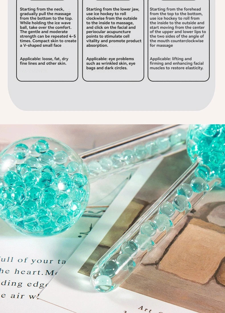 Two clear glass facial massage globes filled with small, turquoise-colored gel beads.