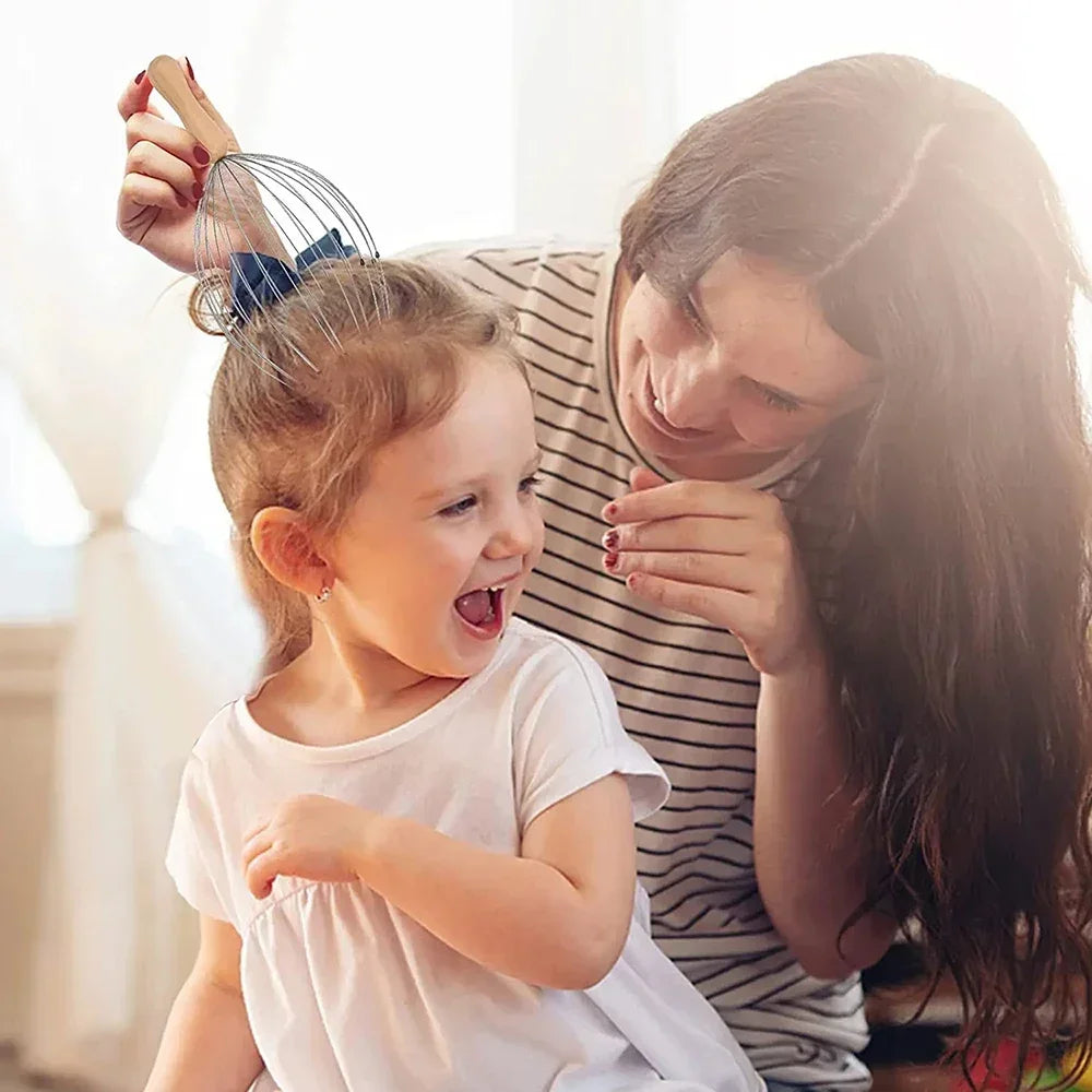 Woman using a 24-finger metal octopus scalp massager with a wooden handle to massage a young girl’s hair.