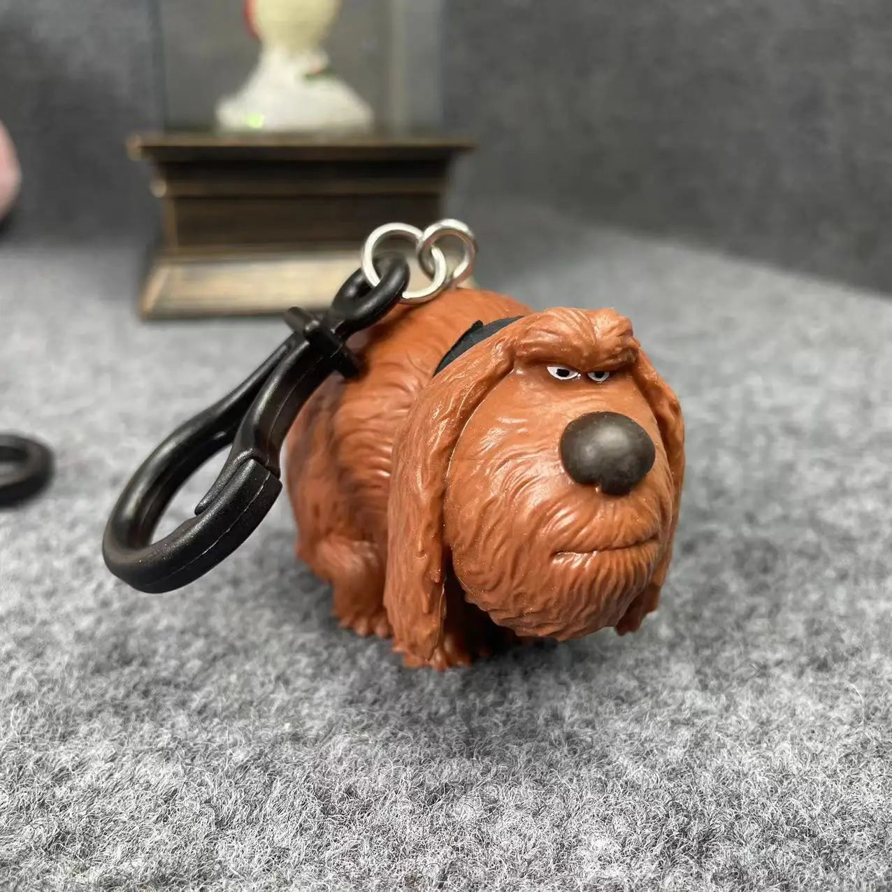 Cute brown dog keychain, animation movie character, perfect as a collectible gift or pet-themed toy accessory.