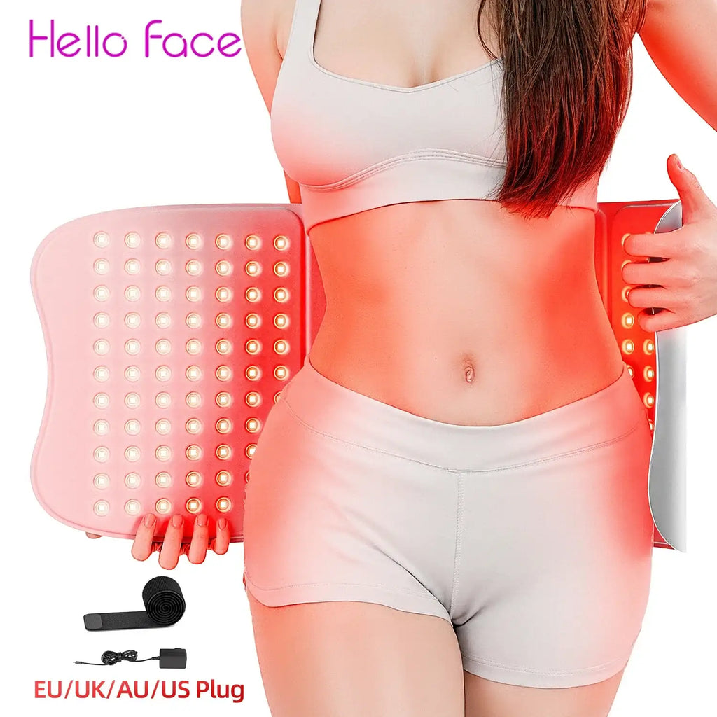 Person wearing a large, flexible pink LED red light therapy mat around their waist, featuring a grid of bright lights.