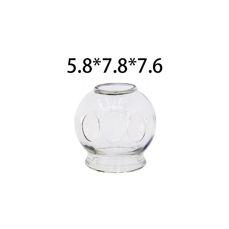 Clear glass fire cupping therapy cup with embossed circular pattern for professional and home muscle pain relief.