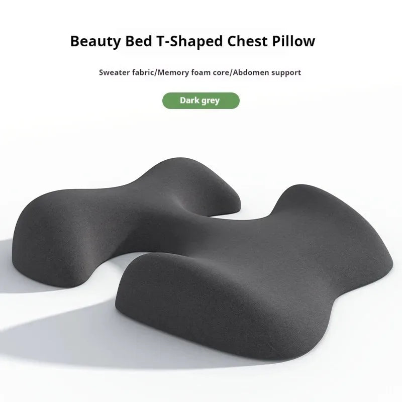 Dark grey T-shaped memory foam chest and abdominal support pillow for beauty salon massage treatments.
