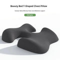 Dark grey T-shaped memory foam chest and abdominal support pillow for beauty salon massage treatments.