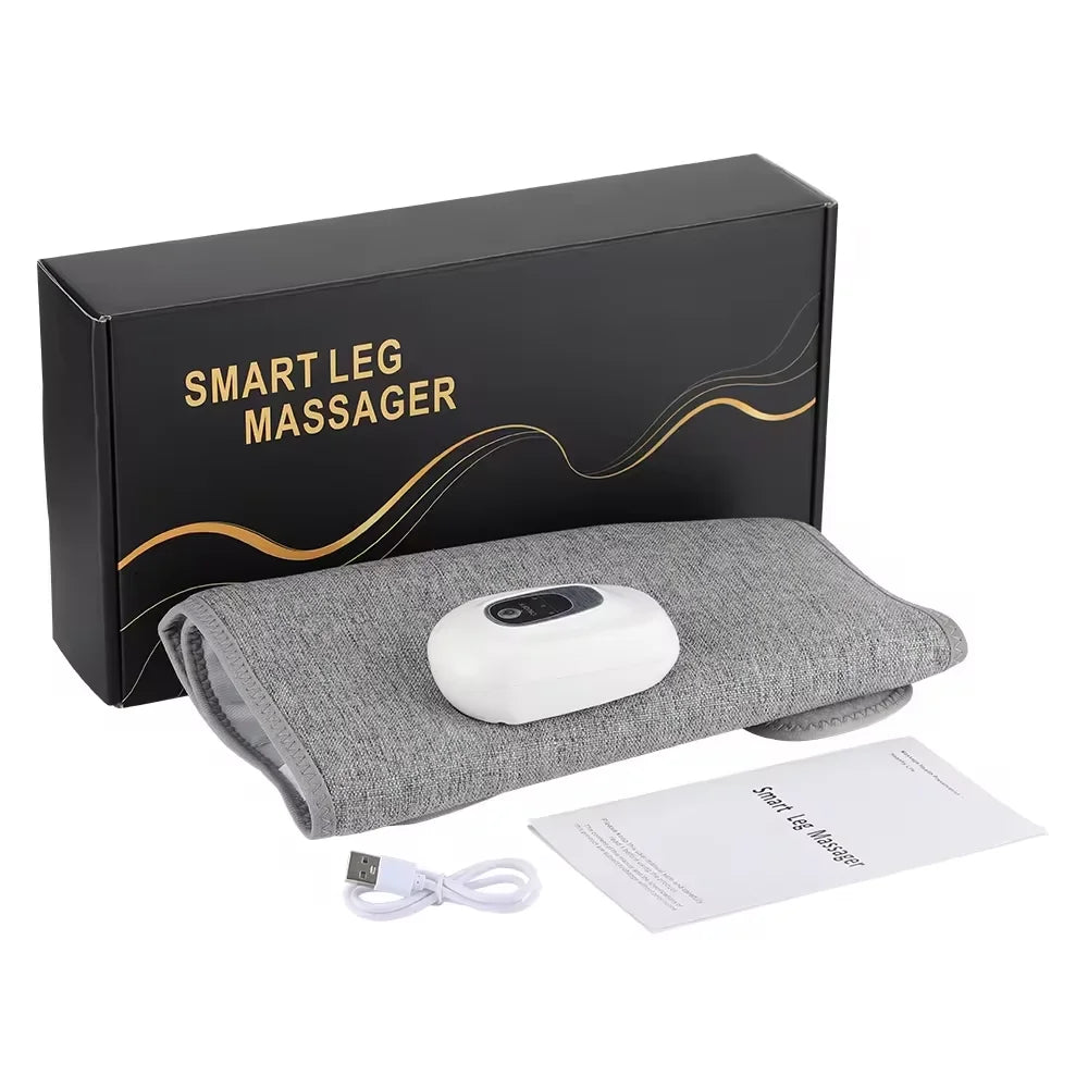 Smart leg massager with grey fabric wrap, white control unit, USB charging cable, manual, and black product box.