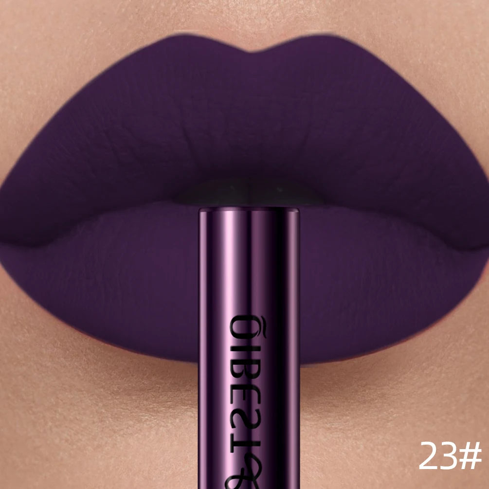 Long-lasting dark purple matte liquid lipstick with a waterproof, velvet finish on lips. Shade 23#.