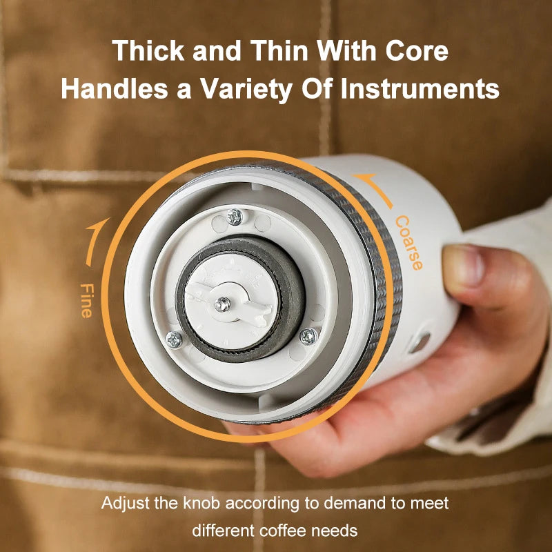 Handheld white manual coffee grinder featuring a steel burr for adjustable fine to coarse grind settings.