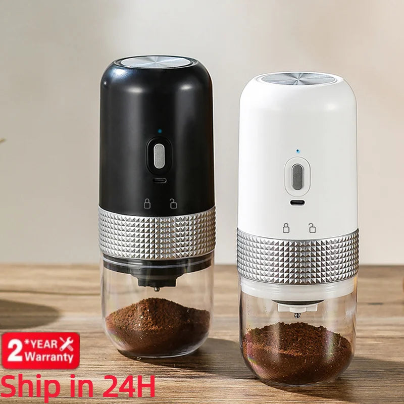 Black and white portable electric coffee grinders with transparent chambers and textured silver metallic rings.