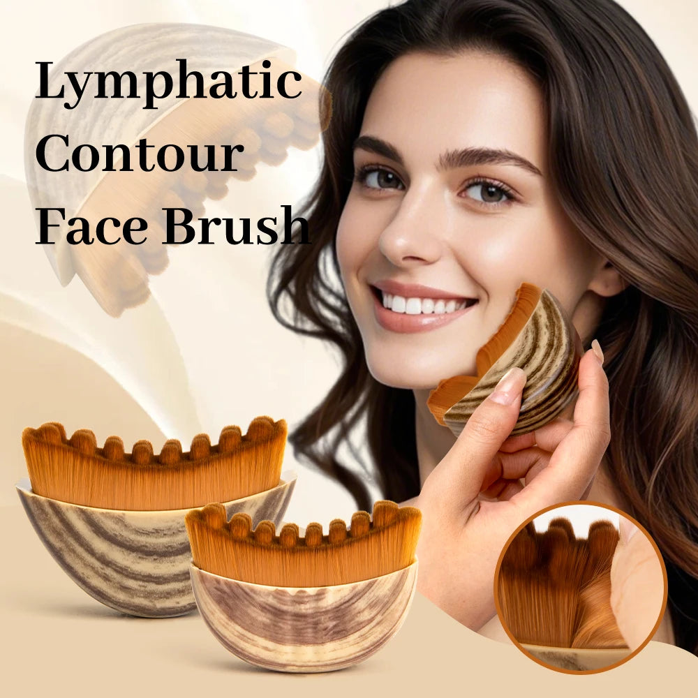 Woman using a crescent-shaped lymphatic face brush with wooden-grain handle and soft, dense orange bristles.
