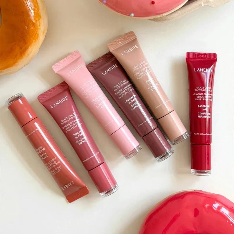 Laneige Glazey Tinted Lip Serum tubes in assorted shades for hydrating, plumping, and glossy lip makeup.