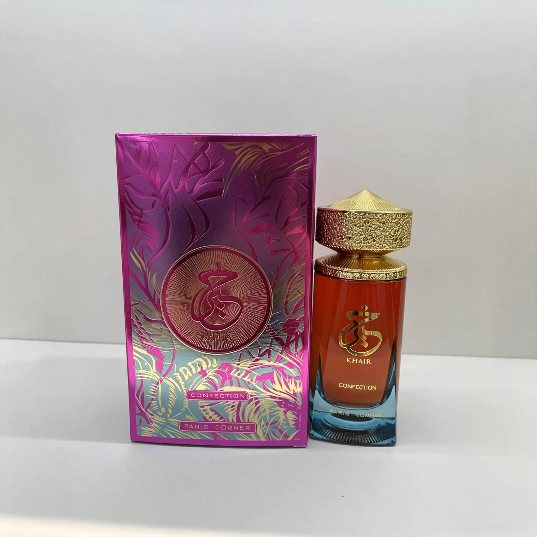 Paris Corner Khair Confection EDP: Premium 100ml unisex Arabian perfume in a sleek bottle with ornate gold cap.