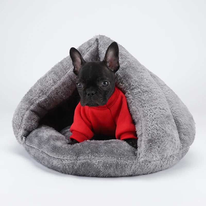 French Bulldog in a cozy, grey plush cave bed, perfect for warm, washable comfort for small dogs and cats.