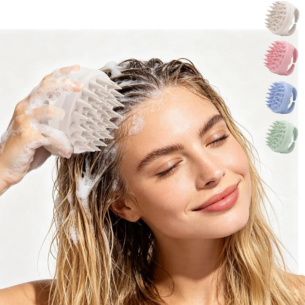 A person using a white silicone scalp massager brush on soapy, wet hair, with color options shown in the corner.