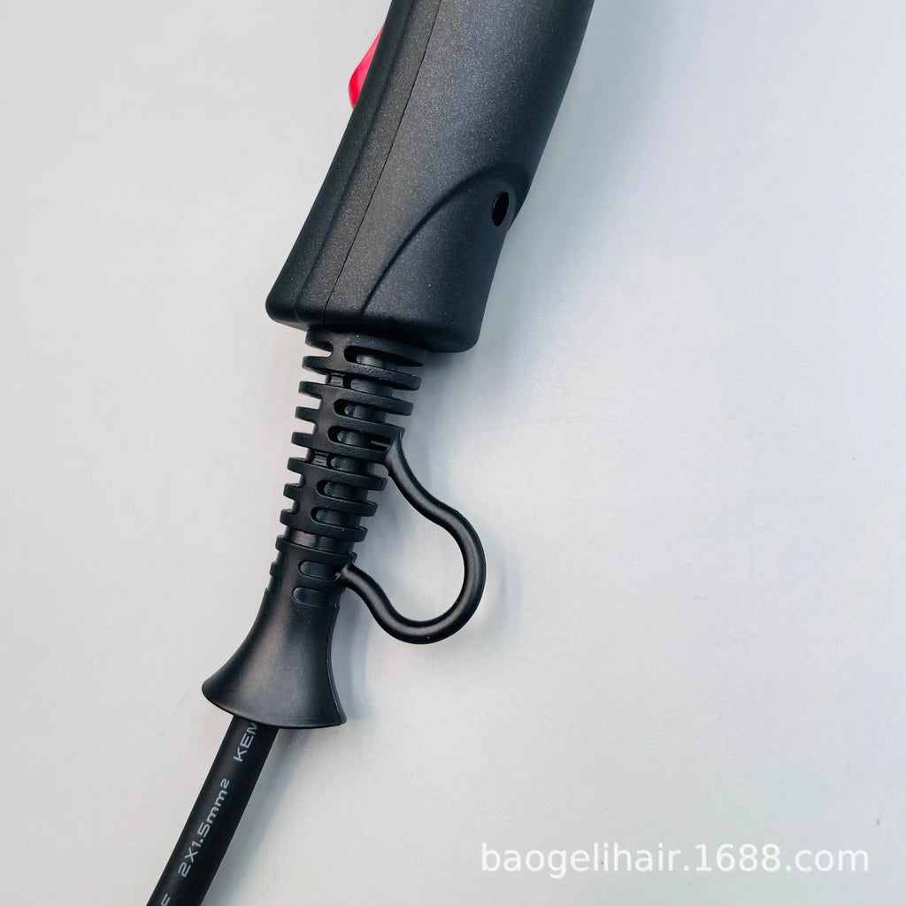 Black 2600W salon hair dryer handle detail featuring a durable power cord with a convenient hanging loop for storage.