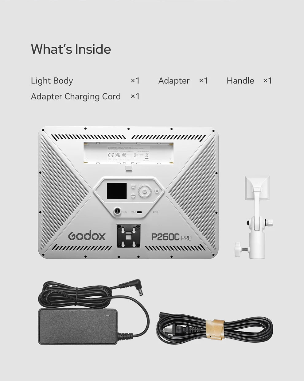 P260C Pro LED panel, white handle, power adapter, and cords for studio photography lighting.
