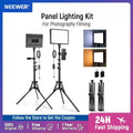 Two LED light panels on black metal tripods with adjustable color temperature for photography and video production.