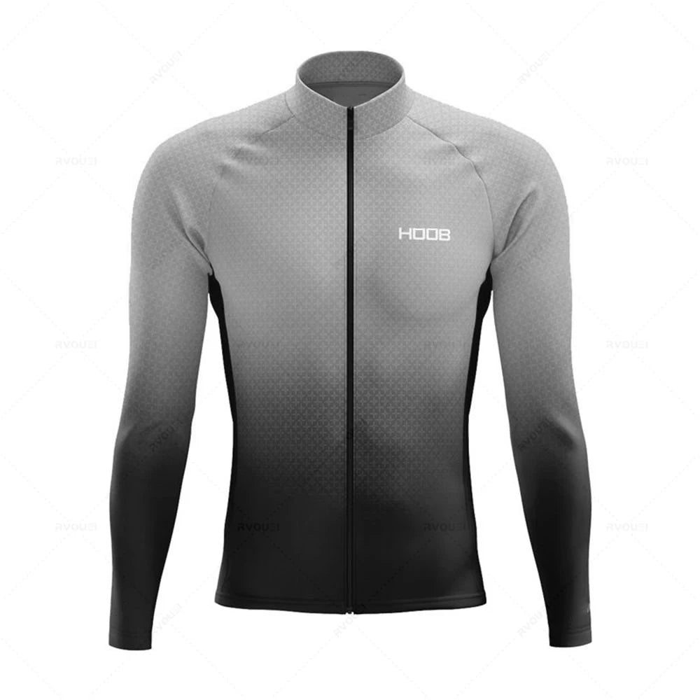 Tidesmit long sleeve cycling jersey with thermal fleece, featuring a grey-to-black ombre geometric pattern and full zip.