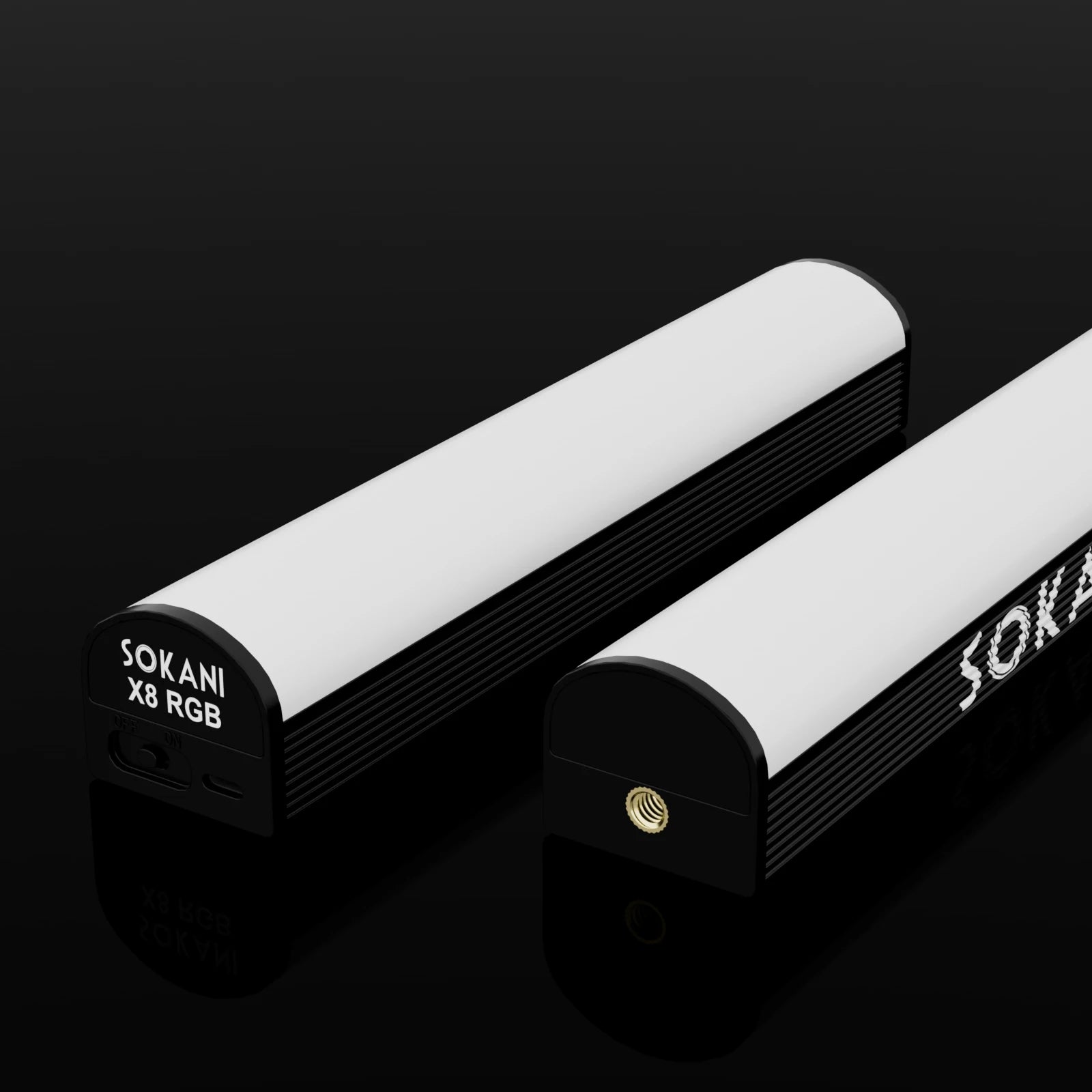 Two black, cylindrical LED light wands with white diffusers, featuring side power controls and tripod mounting holes.