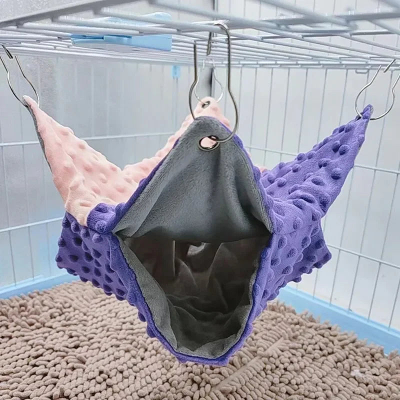 Double-thick, purple and pink fleece hammock for guinea pigs or flying squirrels; cozy, warm pet cage hanging bed.