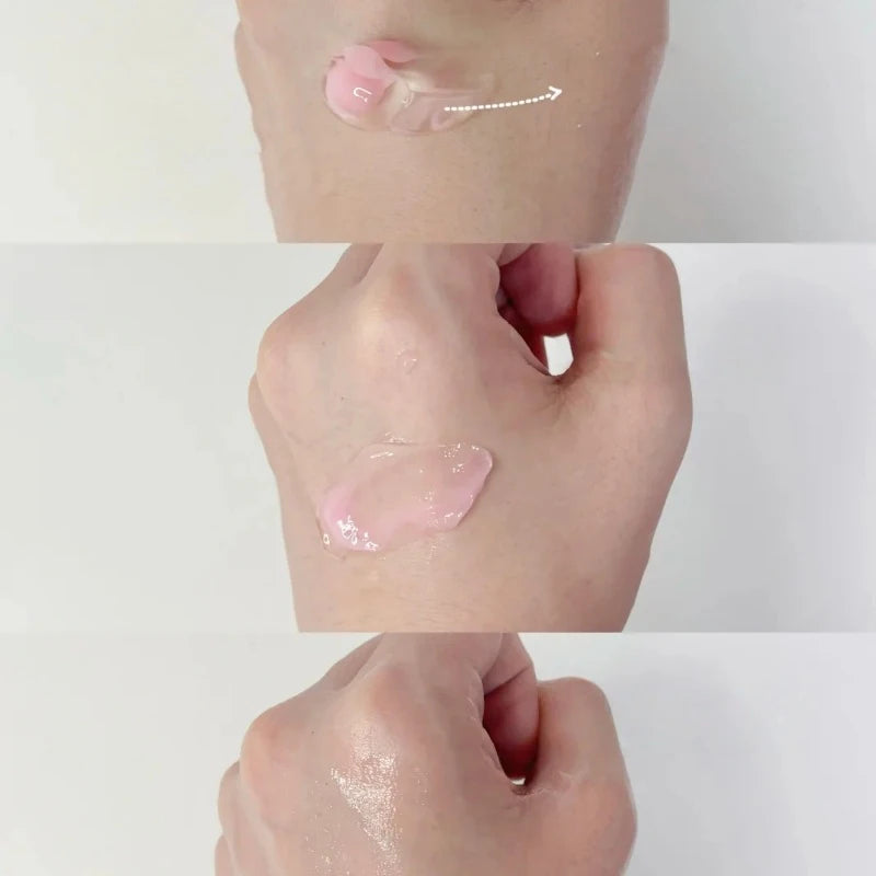 Light pink, translucent gel skincare cream being applied and blended into the skin on the back of a hand.