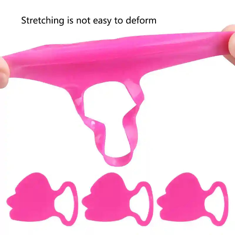 Fingers stretch a flexible, bright pink silicone facial lifting patch against a white background.