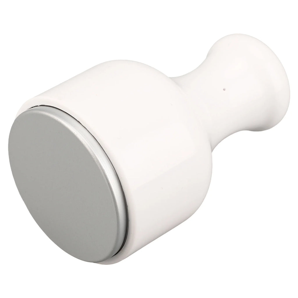 White facial ice roller with a circular silver metal cooling head and an ergonomic handle.