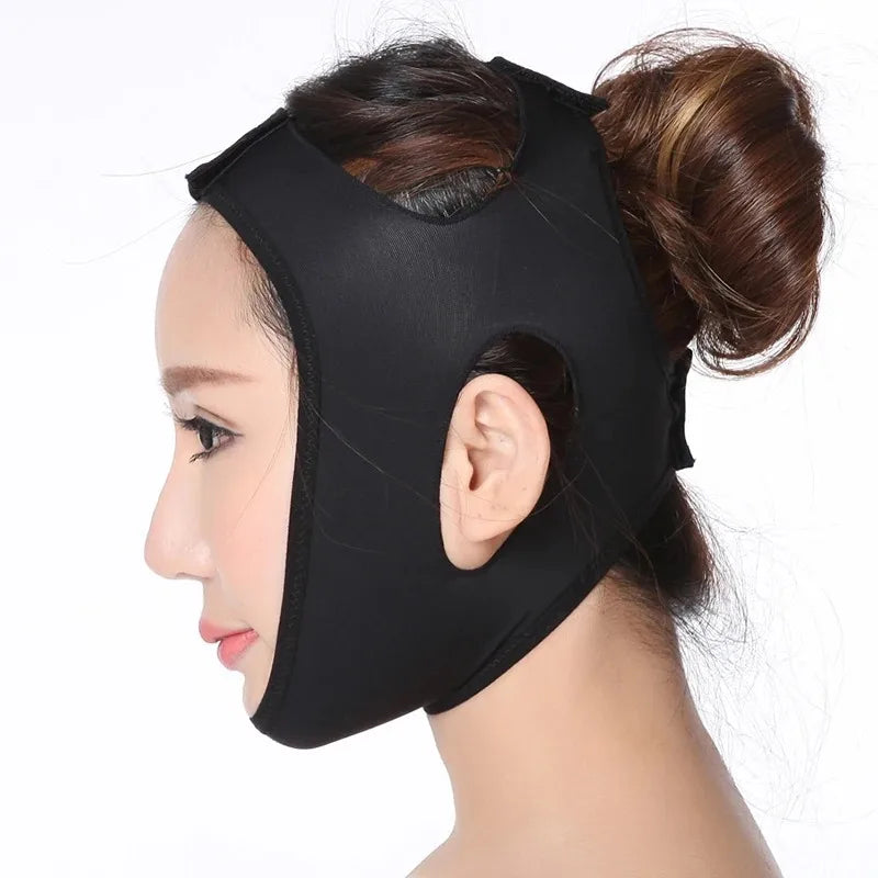 Woman wearing a black elastic V-line face slimming strap with ear cutouts against a white background.