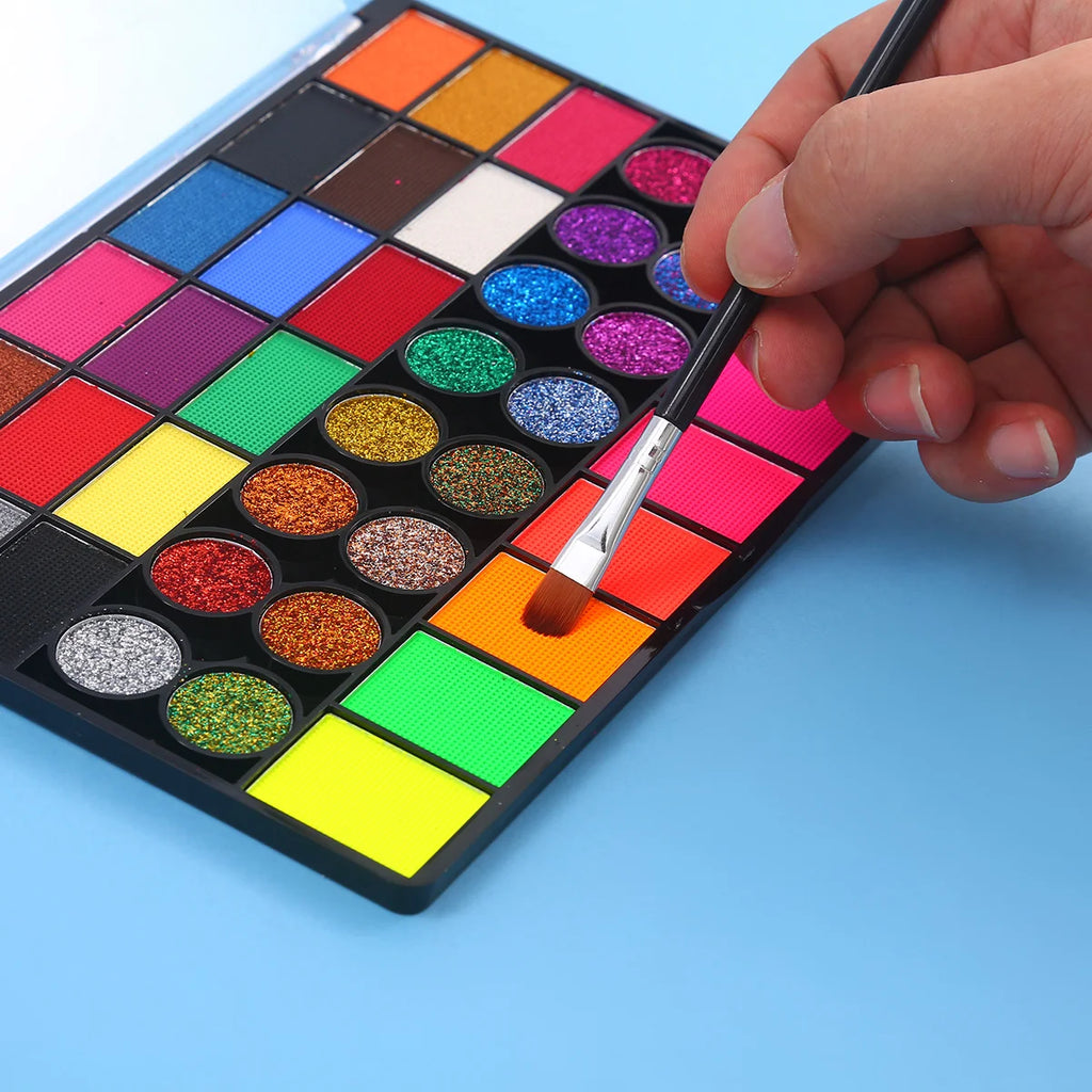 Tidesmit 42 color face and body paint palette showcasing neon glow pigments and water soluble festival makeup texture