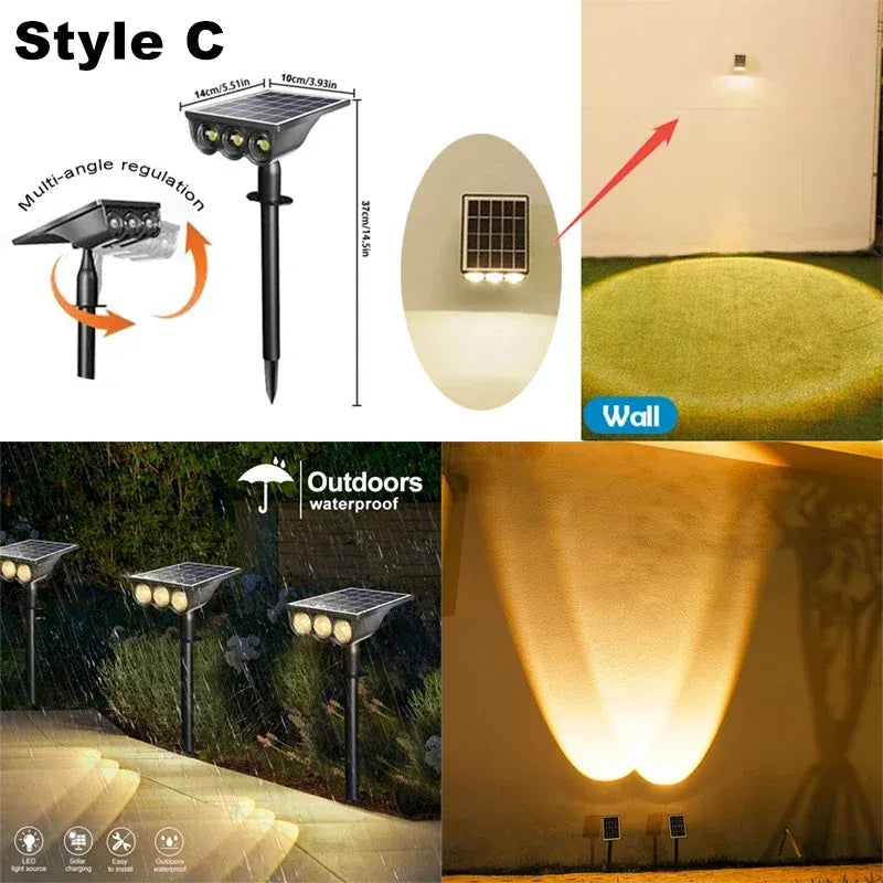 Black solar LED landscape spotlight with an adjustable head, shown illuminating a yard and wall.
