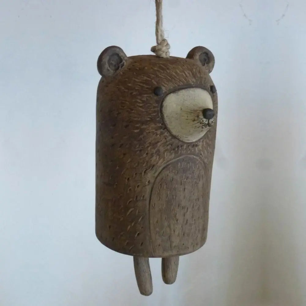 Cute brown resin bear wind chime for rustic garden decor, ideal for a charming outdoor hanging pendant gift.
