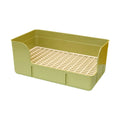 Green plastic rabbit litter box with mesh floor for easy cleaning of small animals like hamsters, rats, and ferrets.