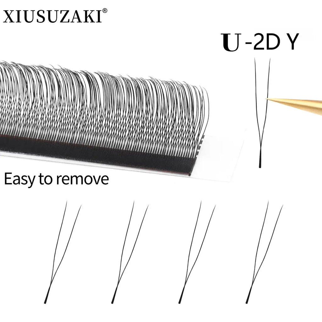 Black 2D Y-shaped eyelash extension clusters on a adhesive strip for professional eyelash application.