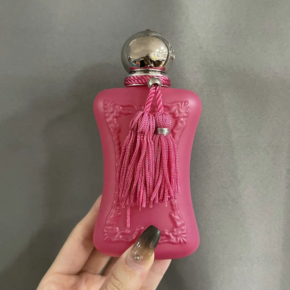 Luxury 75ml floral Eau de Parfum for women in a matte pink bottle with tassel, inspired by Parfums de Marly Delina.