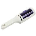 Self-cleaning white and purple pet hair remover brush for efficient cat and dog hair removal from furniture and clothing.