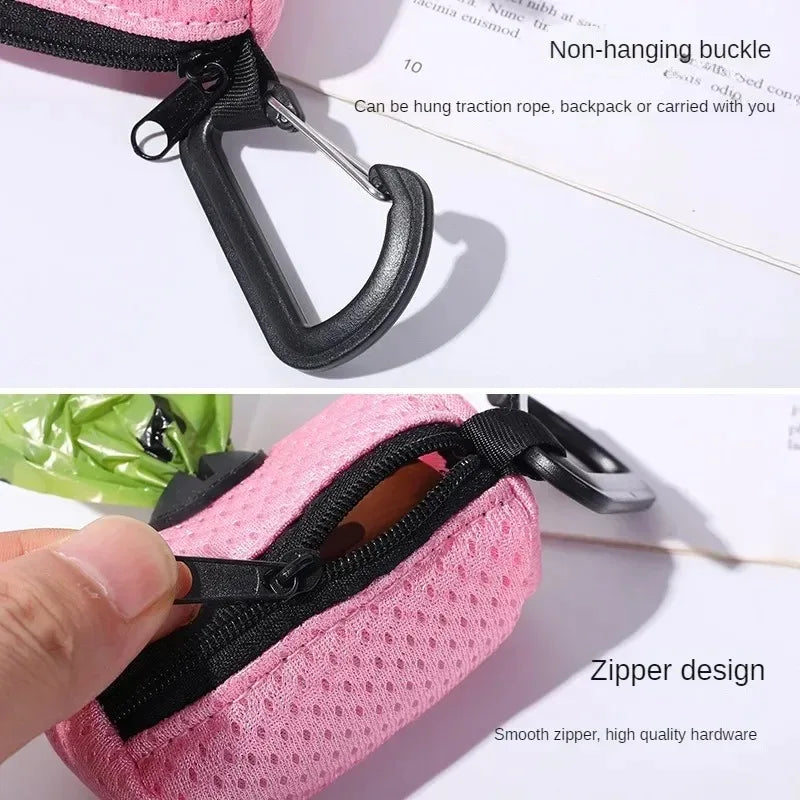 Pink mesh dog poop bag dispenser with carabiner clip for easy leash attachment during walks.