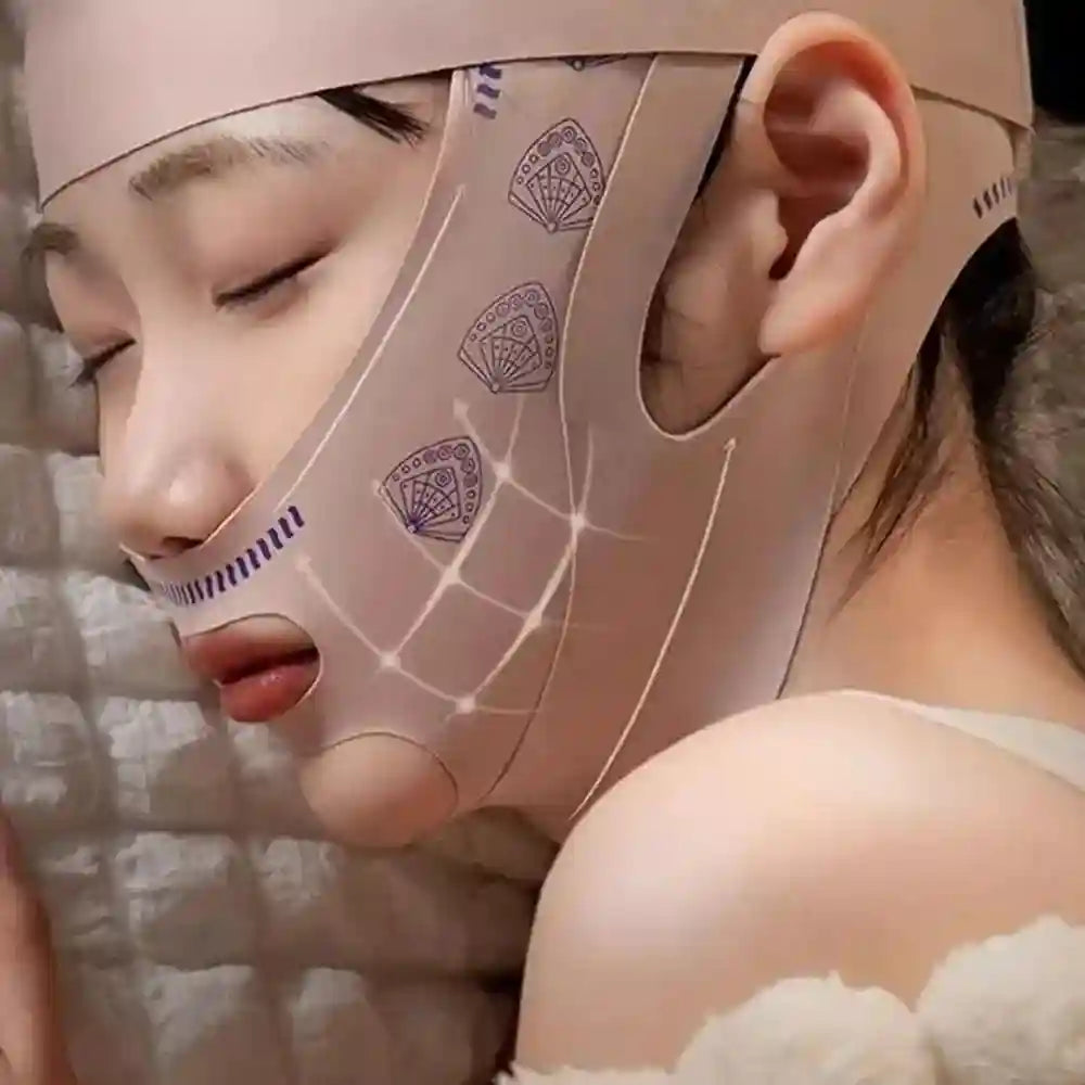 A person wears a beige, elastic V-line face sculpting strap featuring purple fan prints and upward lifting indicators.