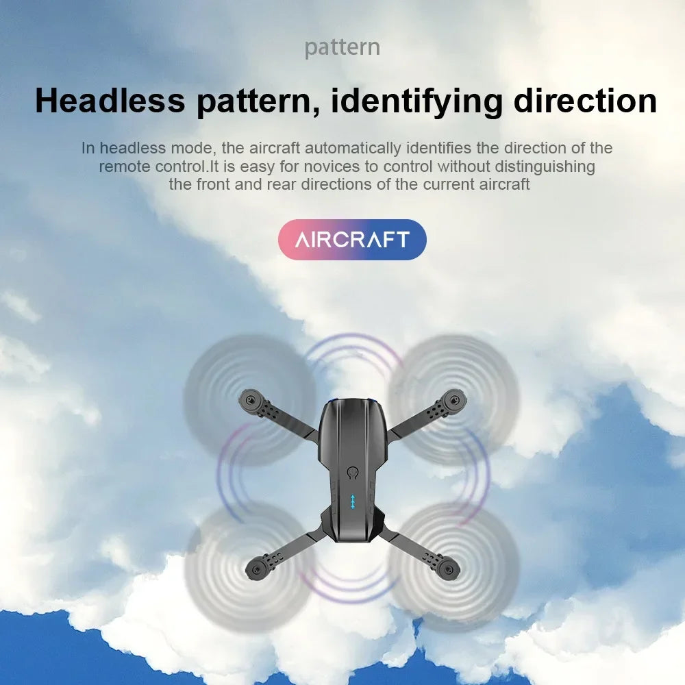 Small black quadcopter drone with four spinning propellers, shown from above to illustrate headless flight mode.